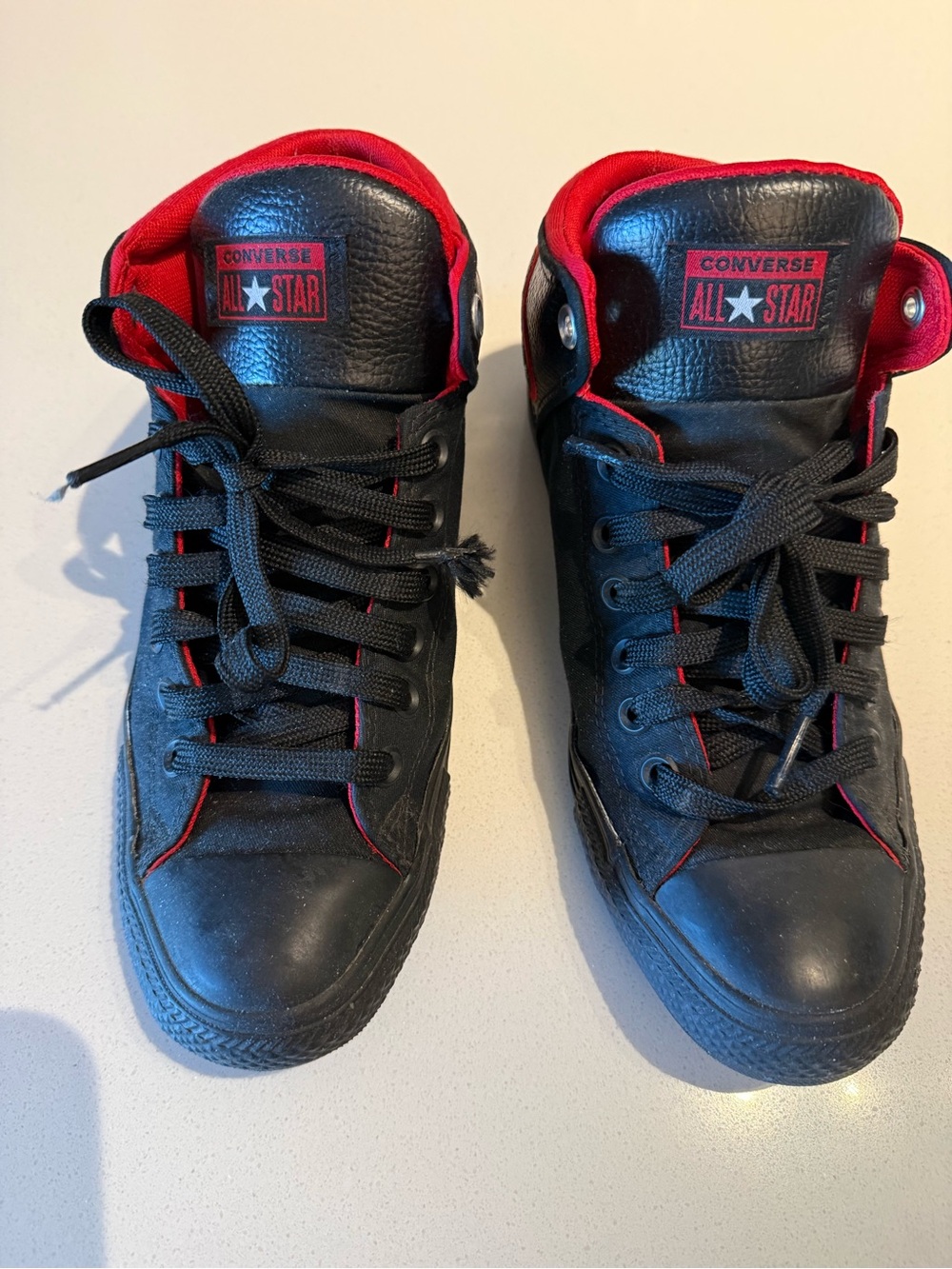 Converse Black High-Top Sneakers with Red Accents